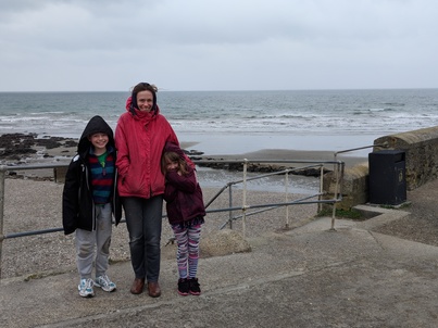 Matthew, Helen and Laura braving the weather at Charlestown