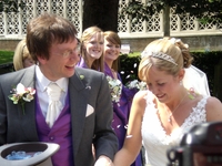 Anthony and Rachael walk the confetti line