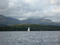 Sun on the mountains from Coniston Water