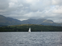 Sun on the mountains from Coniston Water