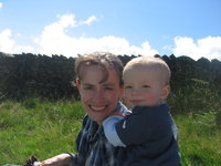 Matthew leaning on Mummy at lunch