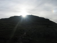 Sun dips behind Pike o' Blisco