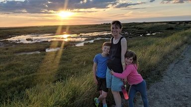 Helen and the children at Cley beach at sunset