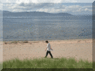 Striding out along the beach